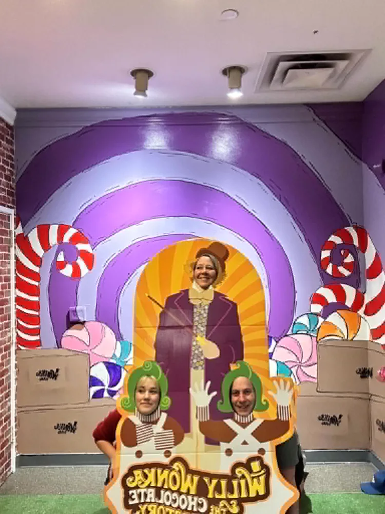 Guests at the Willy Wonka photo op inside Twisted Escape Rooms