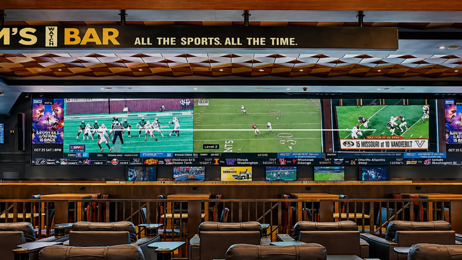 Tom's Watch Bar sports bar interior at ilani, with a large multi-screen video wall